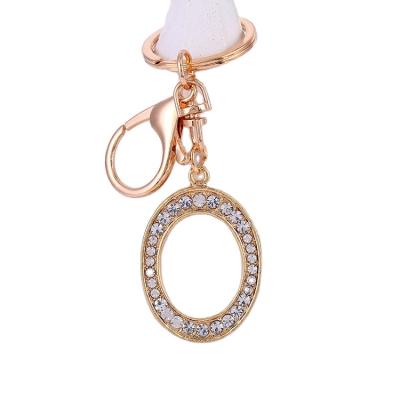 China New Classic Rhinestone Crystal Letter Pendant Keychain Gold color 26 English letters lock Ring Fashion Jewelry Unisex Key chain gifts for sale