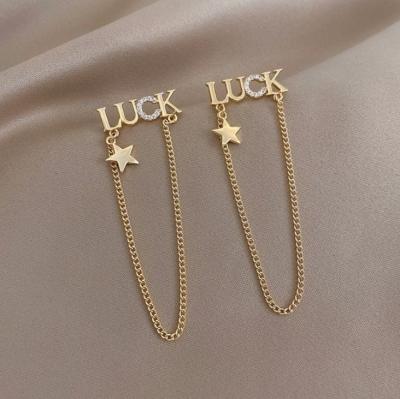 China FASHIONABLE silver lucky five-pointed long tassel earrings new high-end mail S925 LUCK star earrings for sale