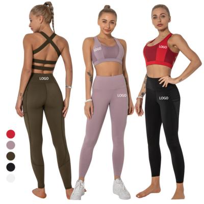 China New Custom Breathable Logo Elasticity Knit Hollow Out Plus Size Cross Back Sports Bra Sexy Tight Women Sport Yoga Bra for sale