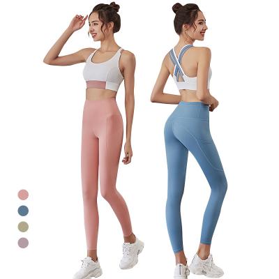 China New Anti Bacterial Antibacterial No Front Seam Yoga Pants Set Workout Sets Women 2 Pieces Plus Size Yoga Legging Track Sport Suits For Ladies for sale