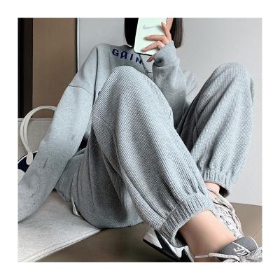 China Anti-wrinkle spring autumn quality loose waffle casual track pants women's waist slim sports free size long wide plus velvet ladies pants for sale