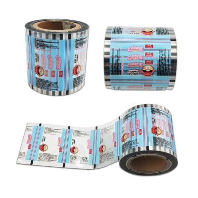 China Moisture Proof Custom Printing Laminated Aluminum Foil Design Candy Roll Film Pet Food Film Laminated Stock Film for sale