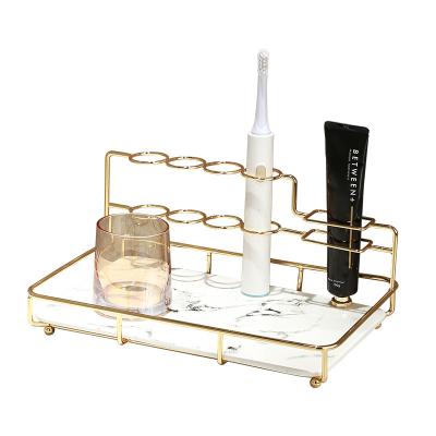 China Stainless Steel Stainless Steel Lipstick Stand Storage Base Holder Earing Shelf Cosmetic Standing Display Marble Standing Necklace Gift for sale