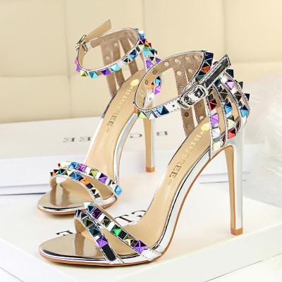 China Height Increasing Chic Hot Selling Heels Silver High Heels PU Women Sandal Rubber Heel Shoes for sale