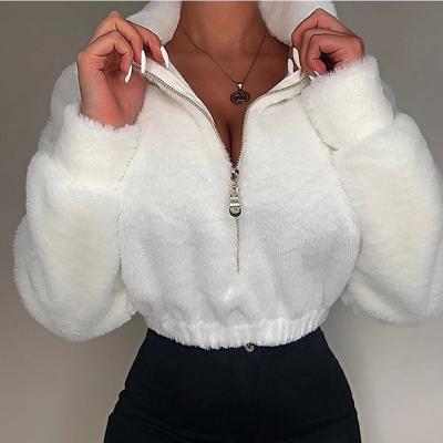 China Anti-wrinkle Autumn Winter Women's New Solid Color Lapel Wrapped Chest Zipper Cardigan Long Sleeve Fashion Quick Sweater for sale