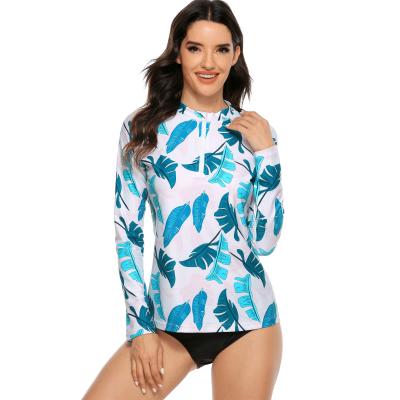 China Antibacterial Custom Design Leave Printed UPF50+ Long Sleeve Women Anti-UV Rash Guard With Zip for sale