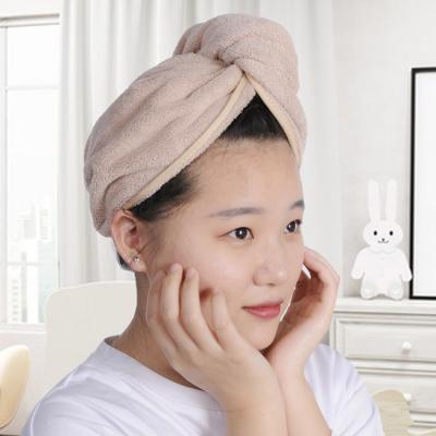 China Customized Super Absorbent Stocked Coral Stocked 300gsm Fleece Hair Wrap Ladies Bath Towel 25cm*65cm for sale