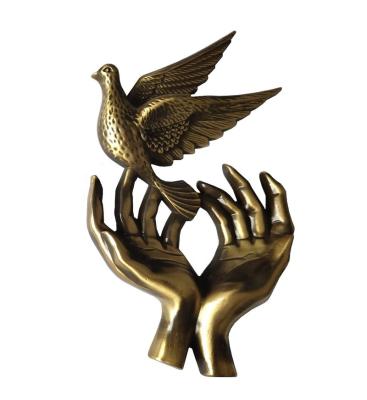 China Brass Antique Bronze Color Brass Dove With Hand For Tombstones for sale