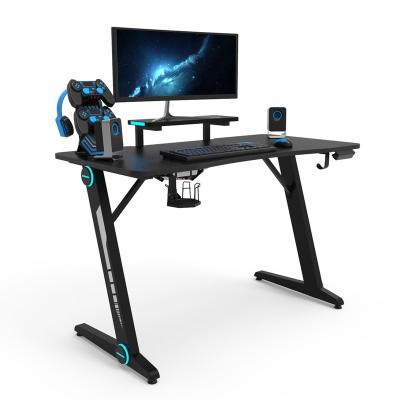 China (Size) Best Selling Ergonomic Adjustable Z Custom Shaped RGB Gaming Desktop Gaming Table With Light And Music For E-sports for sale