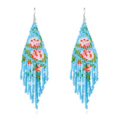 China New BOHEMIA Rice Flower Bohemian Colorful Tassel Long Tassel Dangling Earrings Handwoven Earrings Women Handwoven Earrings for sale