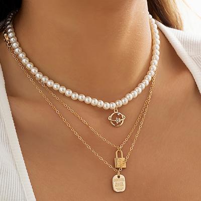 China Vintage Fashion Pearl Beaded Planet Pendant Necklace Ladies Set Multilayer Lock Letter Necklace for sale