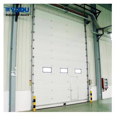 China Industrial Industrial Warehouse Roll Up Doors Sectional Overhead Loading Dock Gates for sale