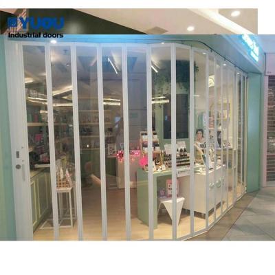 China Industrial Luxury Transparent Side Folding Roller Shutter Door for sale