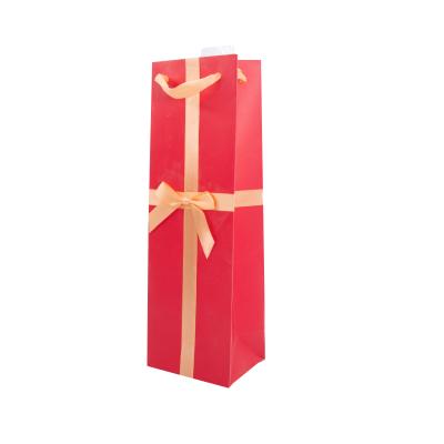 China Handmade Custom Printed Retail Gift Paper Gift Packaging Bag With Ribbon Bow Made In China for sale