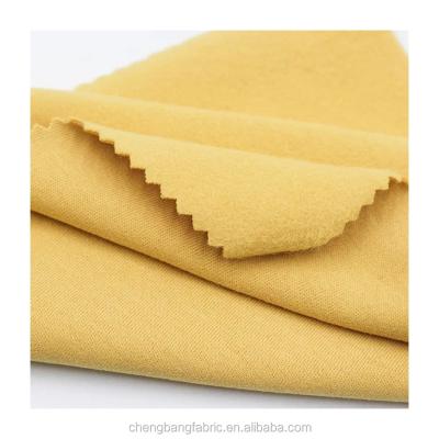 China Anti-Static Heavyweight 330gsm Cotton Spandex Brushed Single Fabric Kid's Jersey Footer Fleece Fabric for sale