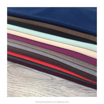 China Memory Polyester Wholesale Interlock Underwear Smooth Brushed Thermal Fabric For Winter Apparel for sale