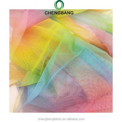 China Soft and lightweight 30-35gsm breathable 100% polyester colorful printed lace Tulle fabric for dancewear, home decoration for sale