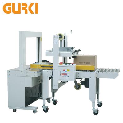 China Automatic Food Carton Box Packing Machine Case Sealer And Strapping Machine for sale