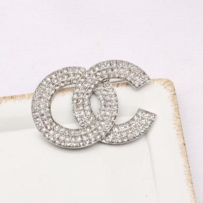 China ALLOY Fashion Studded Elegant Diamond Personality Jewelry Designer Brooch For Women for sale