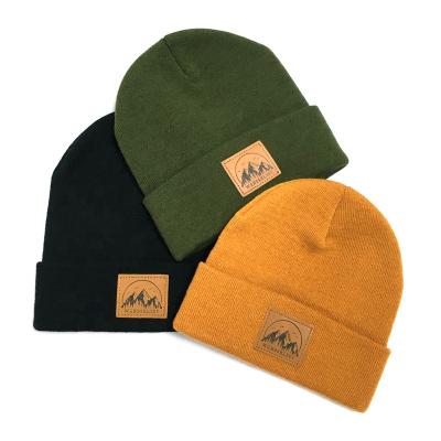 China Various colors JOINT winter beanie with custom leather patch for sale