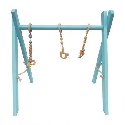 China Educational Toy Most Popular Low Price Eco - friendly Natural Wooden Indoor Baby Activity Gym with Hanging Toys for sale