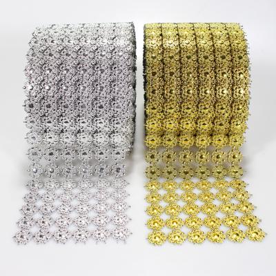 China Flatback 4 Rows Shiny Flower Shape Shiny Petals Diamond Mesh Wrap Roll Faux Rhinestone Crystal Mesh Ribbon Roll for sale