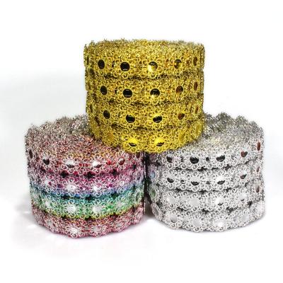 China Flatback 4 Rows Large Shiny Flower Diamond Mesh Wrap Roll Faux Rhinestone Crystal Mesh Ribbon Roll for sale