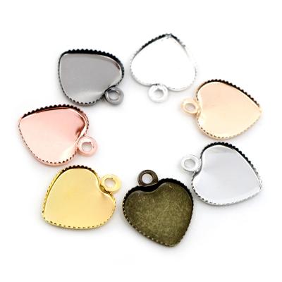 China Cabochon Base Setting Pendant Jewelry Findings 50pcs/Pack 12mm Heart Pendant Cabochon Stainless Setting Base Adjustment 12mm Stainless Iron Heart Blank Setting Trays DIY Jewelry Findings for sale