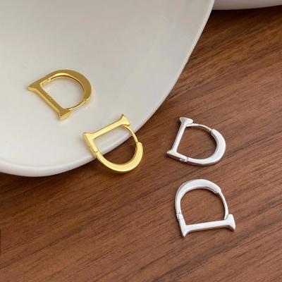 China FASHIONABLE Women's New Design Light Luxury Simple Soft S925 Sterling Silver Letter D Stud Earrings for sale