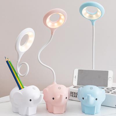 China Modern bedside kids small table lamp usb led night light eyecare revealing led table lamp for sale