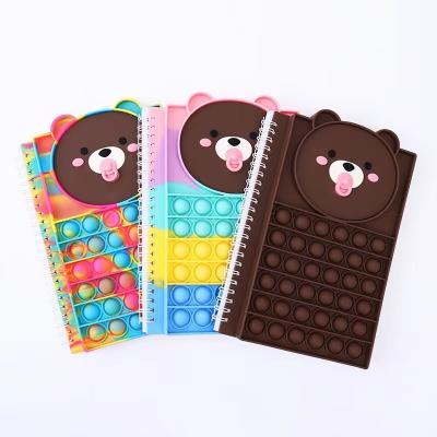 China Amazon 2022 hot sale silicone cover printed notebook stir sensory toys push bubble notebook A5 40 pages notebook push for sale