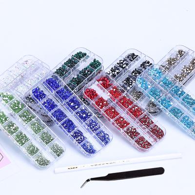 China Nail Art Decoration Wholesale Flatback Nail Crystals Set Coloruful 3D Rhinestone Decorations Kit For Nails Glass Gem for sale