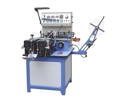 China Beverage Apparel Label Cutting And Folding Machine Label Folding Machine for sale