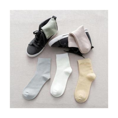 China Women's Knitted Bamboo Socks 2023 Fashionable Solid Color Casual Winter Cotton Socks for sale