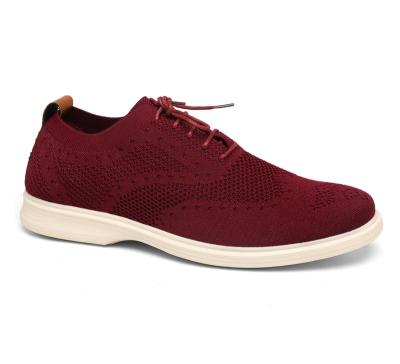 China Red PU Casual Shoes Men Flying Knitted Upper Wear Resistant Casual Sports Shoes for sale