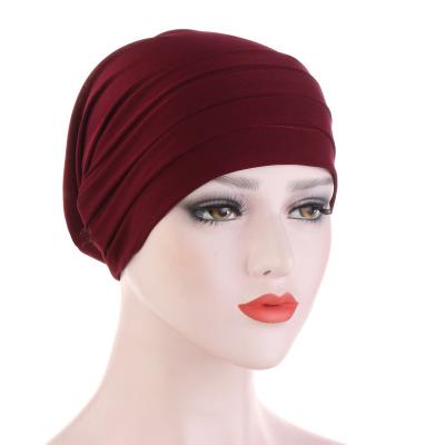 China Simple popular muslim islamic headwear cap turban polyester solid color style inner hijabs for women for sale