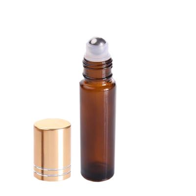 China Perfume/Essential Oil/Lip Oil 50ml Glass Roll On Clear Bottle Amber Essential Oil Roll-On Bottle With Gold Cap for sale