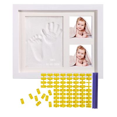 China Hot Selling China Baby Gift Wooden Handprint and Footprint Photo Frame DIY Clay Baby Handprint Kit for sale