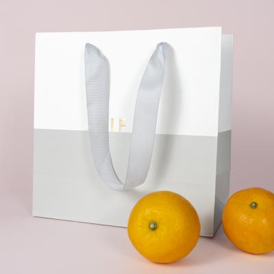 China Eco Friendly Recyclable Paper Sack Recyclable Luxury Paper Bags Gift Packaging White Paper Bag for sale