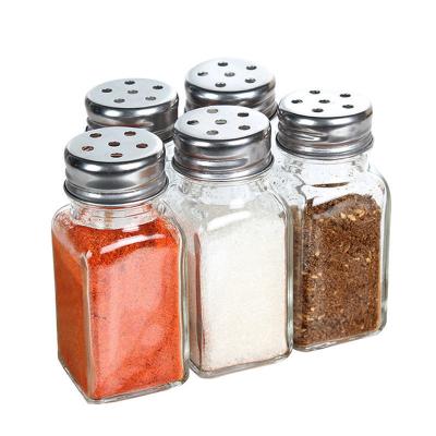 China Hot Sale Kitchenware Storage Storage Jars And Bottles Spice Storage Transparent Glass Bottle With Iron Stainless Lid for sale