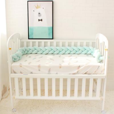 China Super Soft Polyester Filler Tank Top Baby Crib Bedding Soft Fleece Knit Braided Crib Bumper for sale