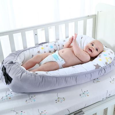 China 2020 New Design Washable Newborn Crib Safety Baby Sofa Sleep Cuddle Nest Organic for sale