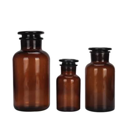 China Hot Selling Chemical 30ml 60ml 125ml 250m 500ml 1000ml Amber Glass Apothecary Reagent Bottle With Glass Stopper for sale