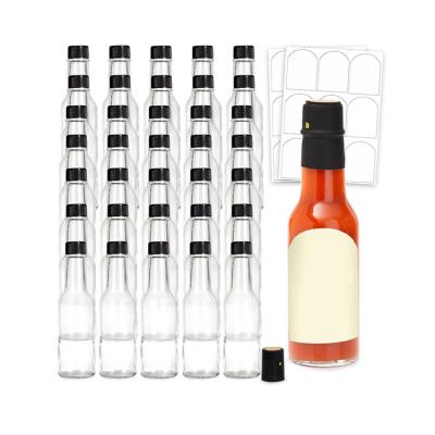 China Luxury 5oz 150ml Syrup Cold Daze Hot Sauce Glass Bottles With Leak Proof Screw Lids for sale