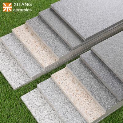 China Exterior tiles xitang to brand anti-slip 300x600x18mm driveway square hotel parking garden balcony path outdoor paving tiles for sale