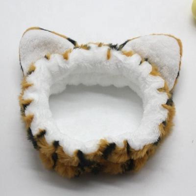 China Daily Life Fashion Tiger Ear Plush Cute Spa Headband Washing Face Makeup Elastic Hairbands Wholesale Accessories For Girls and Women for sale