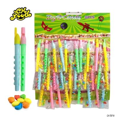 China Cartoon Toys Chinese Cheap Plastic Musical Instruments Toy With Candy Promotional Toy for sale