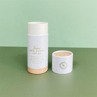 China Biodegradable Custom Gold Foil Cosmetic Essential Oil Bottle Container Cylinder Packaging for sale