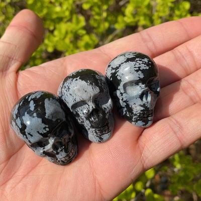 China Wholesale Decorative Snowflake Mini Skulls From China Mini Head Healing Carved Crystal For Home Decoration for sale