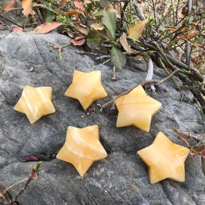 China Wholesale Natural Quartz Crystal Carvings For Healing from China Crystal Stars Yellow Orange Calcite for sale